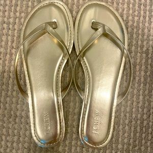 Never Worn. Gold J.Crew Flip Flops. Perfect for any warm weather destination.